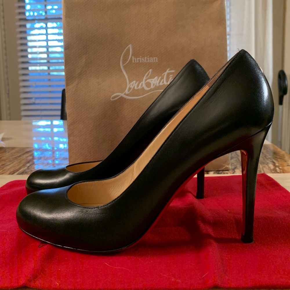 Christian Louboutin - Black Pumps